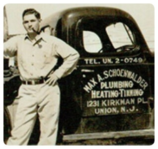 Max Sr. standing in front of the original service truck in the 1920s.