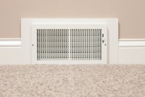 Stagnant-heating-vent-on-wall-near-floor