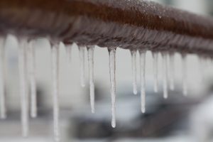 brown-pipe-with-icicles-dripping