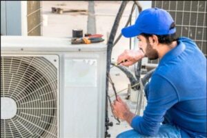 technician-working-on-air-conditioner