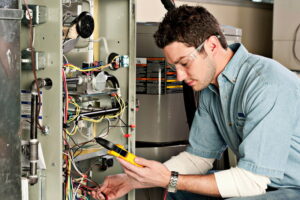 technciian-working-on-furnace