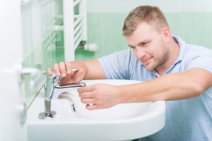 plumber-working-on-sink